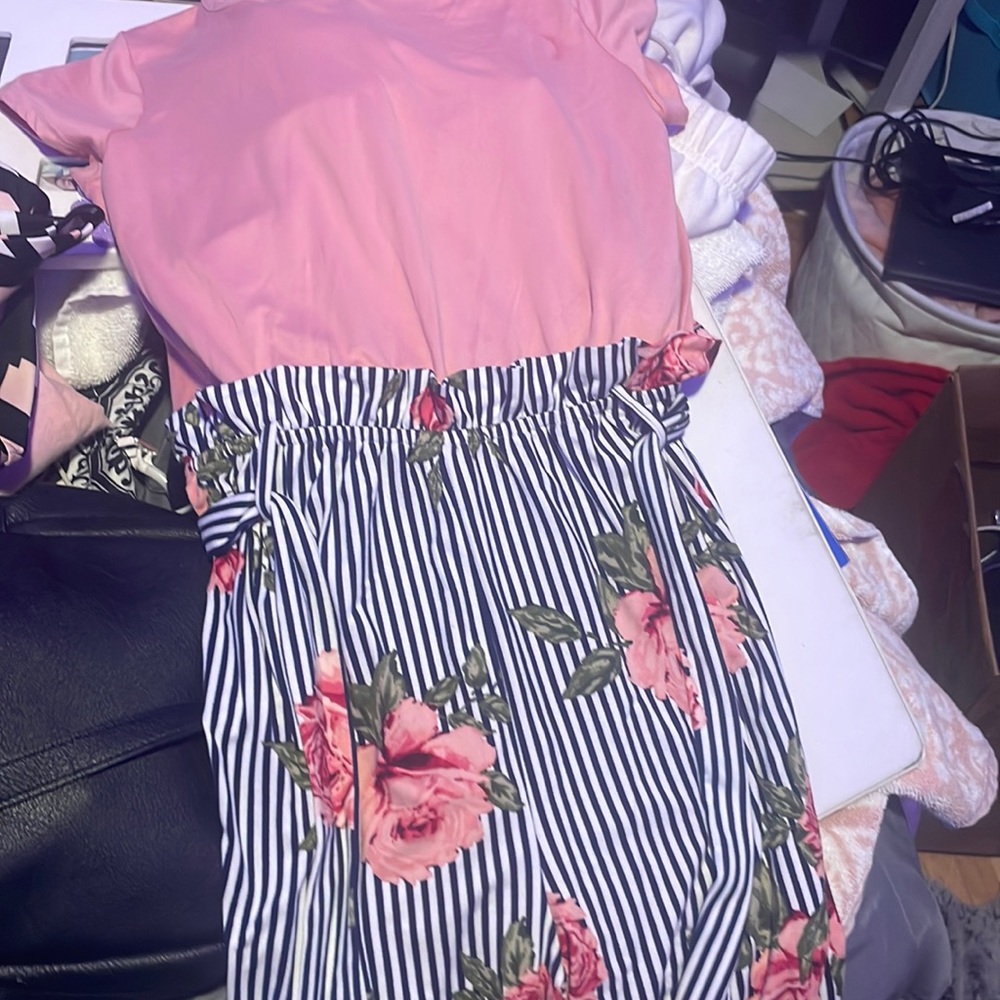 Woman's jump suit, size 16. Soft material .
